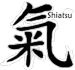 chinesisches Schriftzeichen 'Qi' mit Schriftzug Shiatsu