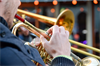 Symbolbild für Blasmusik - Bild zeigt Bildausschnitt eines Trompeters
