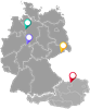 Landkartenumrisse Österreich-Deutschland mit den Standorten der vier Partnergemeinden